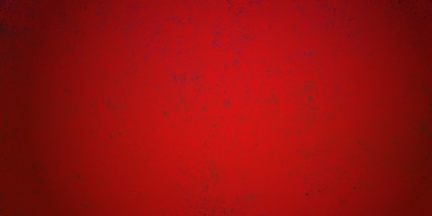 Elegant red Christmas background with grunge distressed paint texture in old vintage design with black vignette border and dark speckled paint spatter