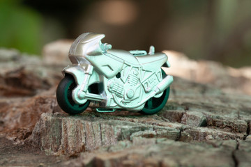 Small toy gray sports bike.