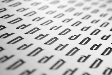 Handwriting black and white symbol filling pattern. Calligraphic letter D learning skills paper...