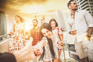 Group of friends making party on a yacht in Dubai