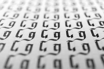 Calligraphy black and white letters G background. Lettering practice writing worksheet. Handwriting...