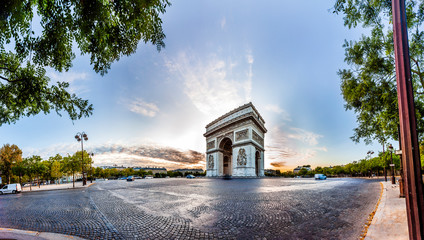 Paris Triumphal Arch the Arc de Triomphe de l’Etoile at the western end of the Champs-Elysees at...