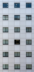 texture ready white facade with windows of an office building in tokyo japan