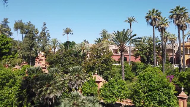 The idyllic garden in the Royal Alc&aacute;zars of Seville, Andalusia, Spain. June-05-2019