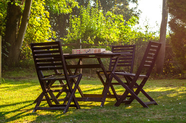 Garden chairs and table in summer