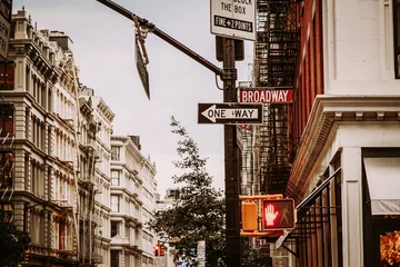 Tuinposter Broome and Broadway street crossing in SoHo District, New York City © Michal Ludwiczak