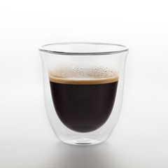 The glass of coffee isolated on white background. Top view at an angle. For design.
