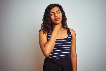 Transsexual transgender woman wearing striped t-shirt over isolated white background Touching painful neck, sore throat for flu, clod and infection