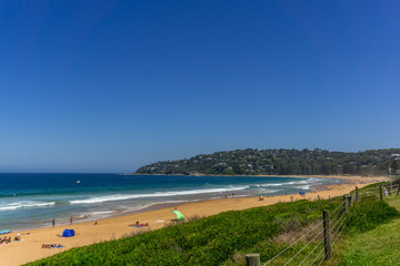 Long sandy beach in Palm Beach, New South Wales, Australia