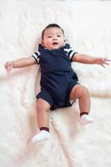 Fototapeta premium Happy newborn cute baby in studio