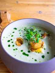 Green pork Curry , with microgreens , shrimps Thai cuisine, selective focus