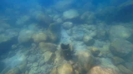 Rusty pipe under water