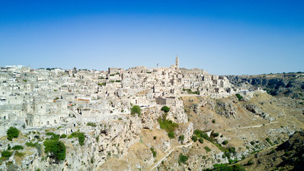 Fototapeta na wymiar Aerial photo shooting with drone of Matera, a famous Italy town for houses of stones, is one of the Italian sites inscribed in the UNESCO World Heritage List