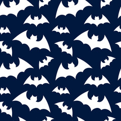 Vector pattern background with bats silhouettes for halloween design. Seammles pattern swarm of bats on the dark blue background. Happy Halloween