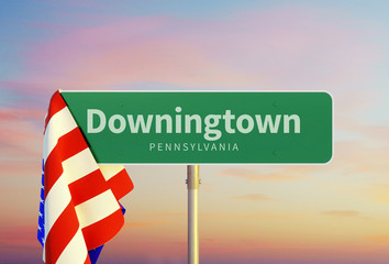 Downingtown – Pennsylvania. Road or Town Sign. Flag of the united states. Sunset oder Sunrise Sky. 3d rendering