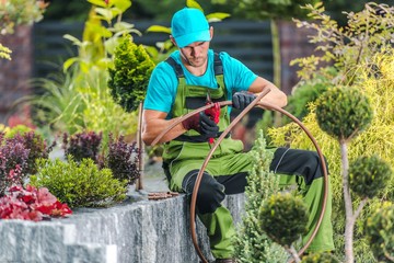 Men Building Garden Irrigation