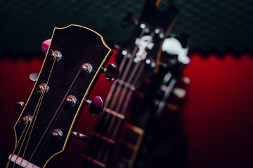 A set of classical and electric guitars. Music concept. Guitars for musicians, sale of guitars, musical instruments. Playing musical instruments, creating.