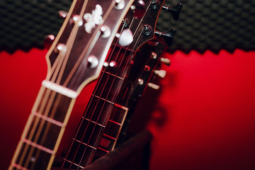 A set of classical and electric guitars. Music concept. Guitars for musicians, sale of guitars, musical instruments. Playing musical instruments, creating.