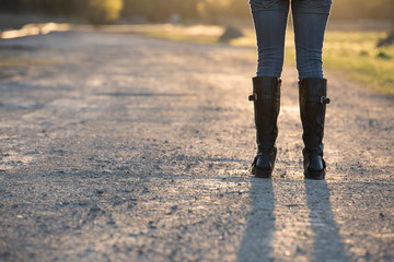 person walking on the gravel