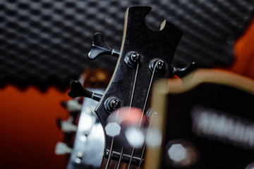 A set of classical and electric guitars. Music concept. Guitars for musicians, sale of guitars, musical instruments. Playing musical instruments, creating.