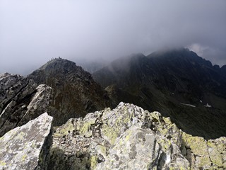 Landscape in the mountains  with stormy clouds above.  Fagaras - Lespezi and Coltu Caltunului Peaks