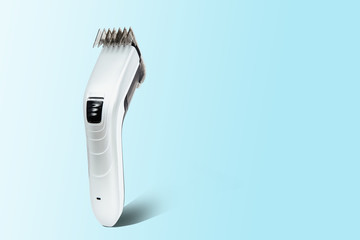 Hair clipper on a pastel blue background. The concept of cutting, improving the appearance. Going to the hairdresser, cutting hair at home. Taking care of appearance.