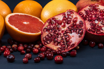 Citrus fruits on dark background in closeup.
