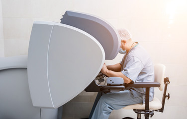 Obraz premium Modern surgical system. Medical robot. Minimally invasive robotic surgery.