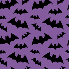 Fototapeta premium Vector pattern background with bats silhouettes for halloween design. Seammles pattern swarm of bats on the purple background. Happy Halloween