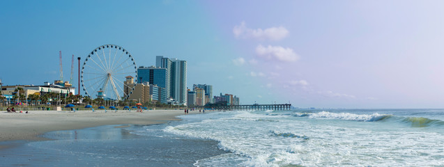Panoramic view of Myrtle Beach, South Carolina with beach, hotels, ferris wheel, and boardwalk. © Wollwerth Imagery