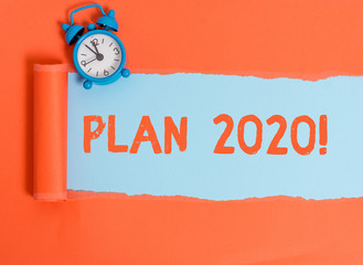Conceptual hand writing showing Plan 2020. Concept meaning detailed proposal doing achieving...