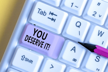 Conceptual hand writing showing You Deserve It. Concept meaning should have it because of their...