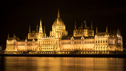 Fototapeta na wymiar Hungarian Parliament at night on the bank of Danube river