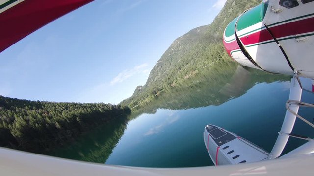 Float Plane Taking Off From Lake 