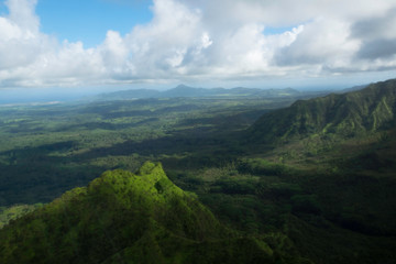 Kauai island landscape with green hills and clouds 