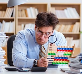 Funny accountant bookkeeper working in the office