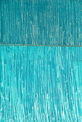 close-up on blue an turquoise fabric from car wash as background