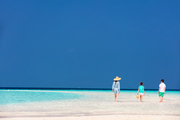 Mother and kids at tropical beach