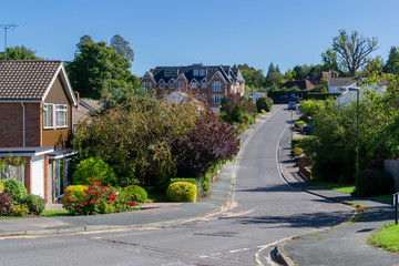 English village street view with houses and road