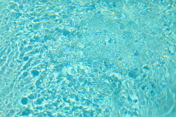 Water rippling in a swimming pool 