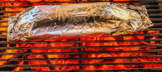 grilling barbecue on aluminum foil