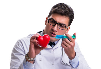 Young male cardiologist doctor holding a heart isolated on white