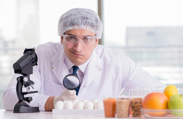 Nutrition expert testing food products in lab