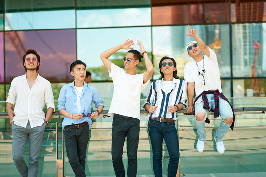 asian young people hanging out on street