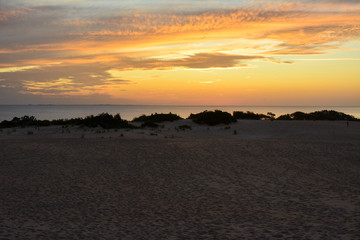 Sunset over the sound as seen from the top of the sand dunes in Jockeys Ridge State Park on the Outer Banks