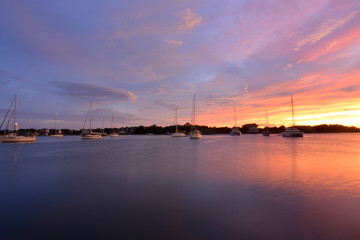 Fototapeta na wymiar Sunset over the harbor on Ocracoke Island, North Carolina