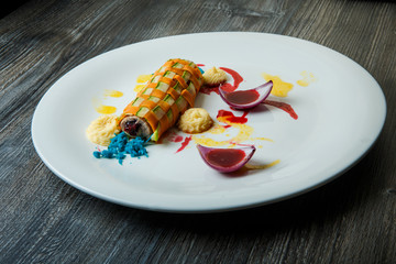 finely decorated vegetable roll stuffed with minced meat