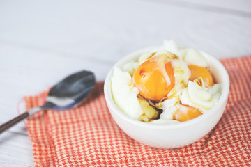 boiled egg on bowl with sauce for breakfast on the table background - Soft boiled eggs