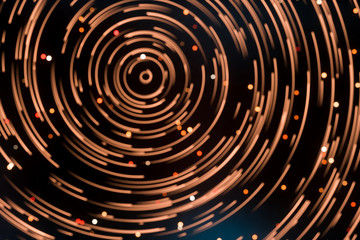 Particles revolves around its center with dark background, 3d rendering.