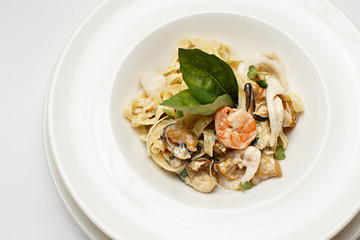 seafood pasta in a white background